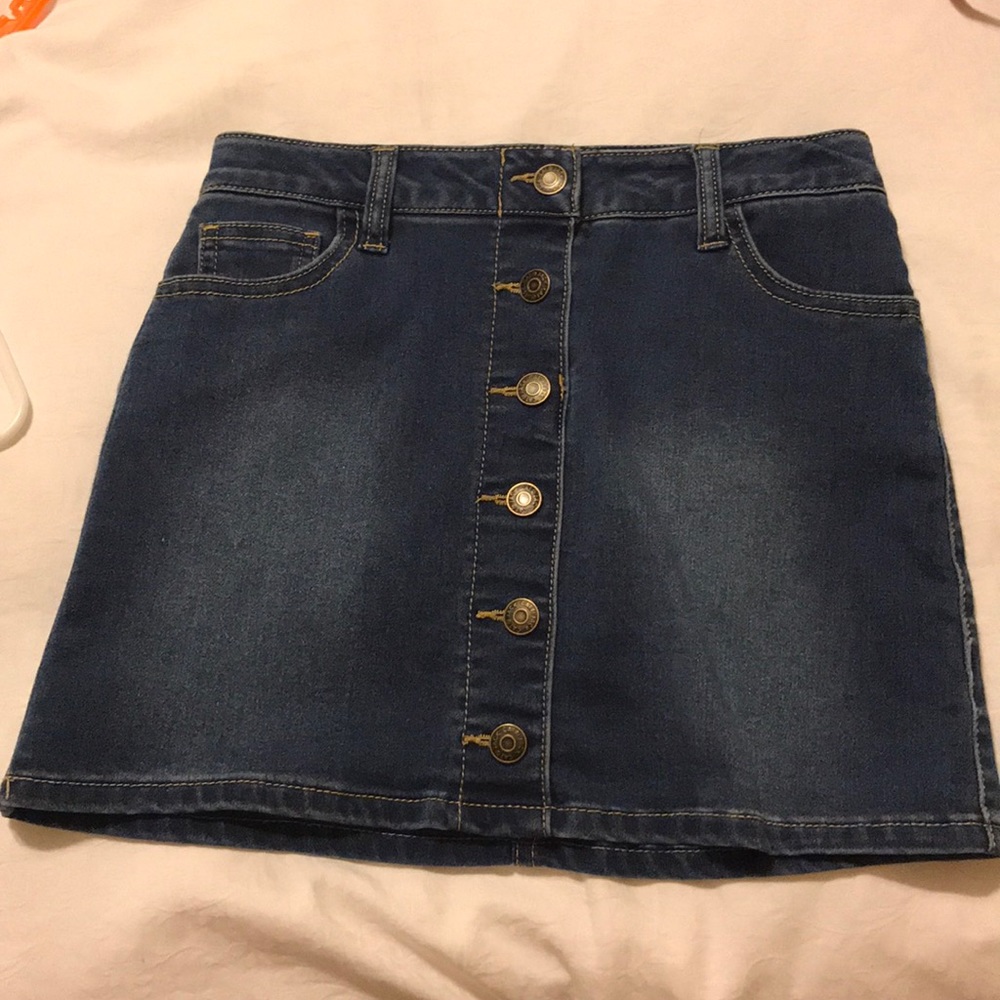 Girls jean skirt. Washed but never worn!! 7/8
